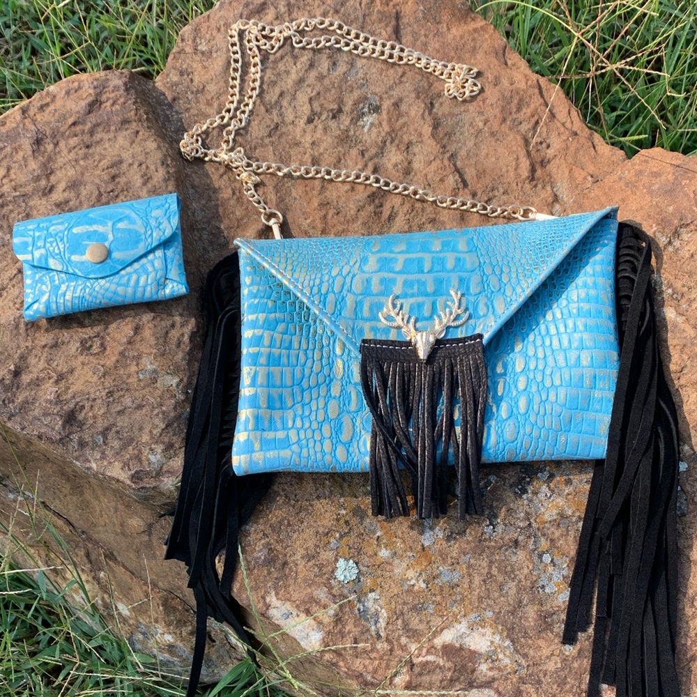 Elegant Blue Crossbody Bag with Fringe